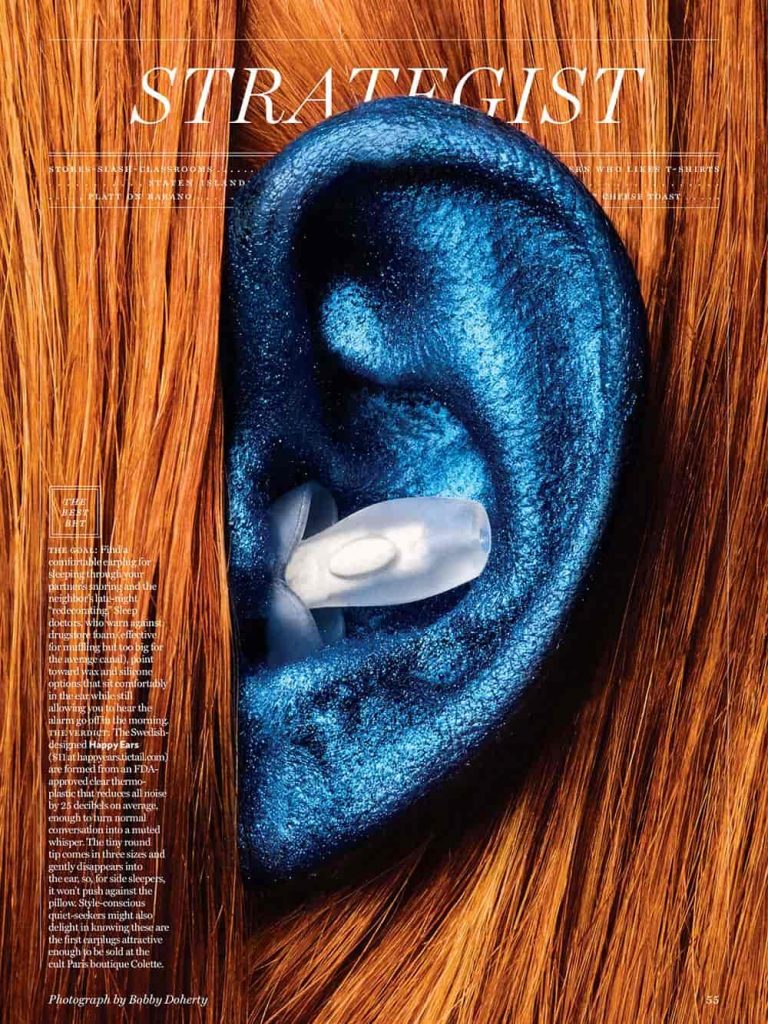 Strategist magazine cover showing blue ear with happy ears earplugs in