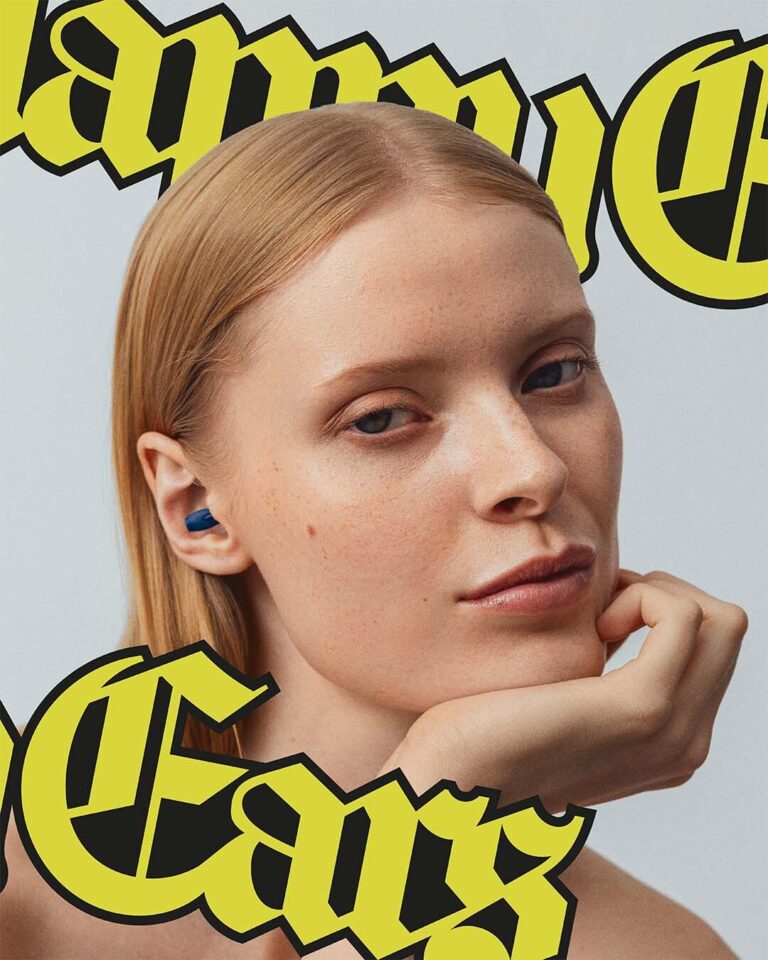 Happy Ears earplugs female model with logo